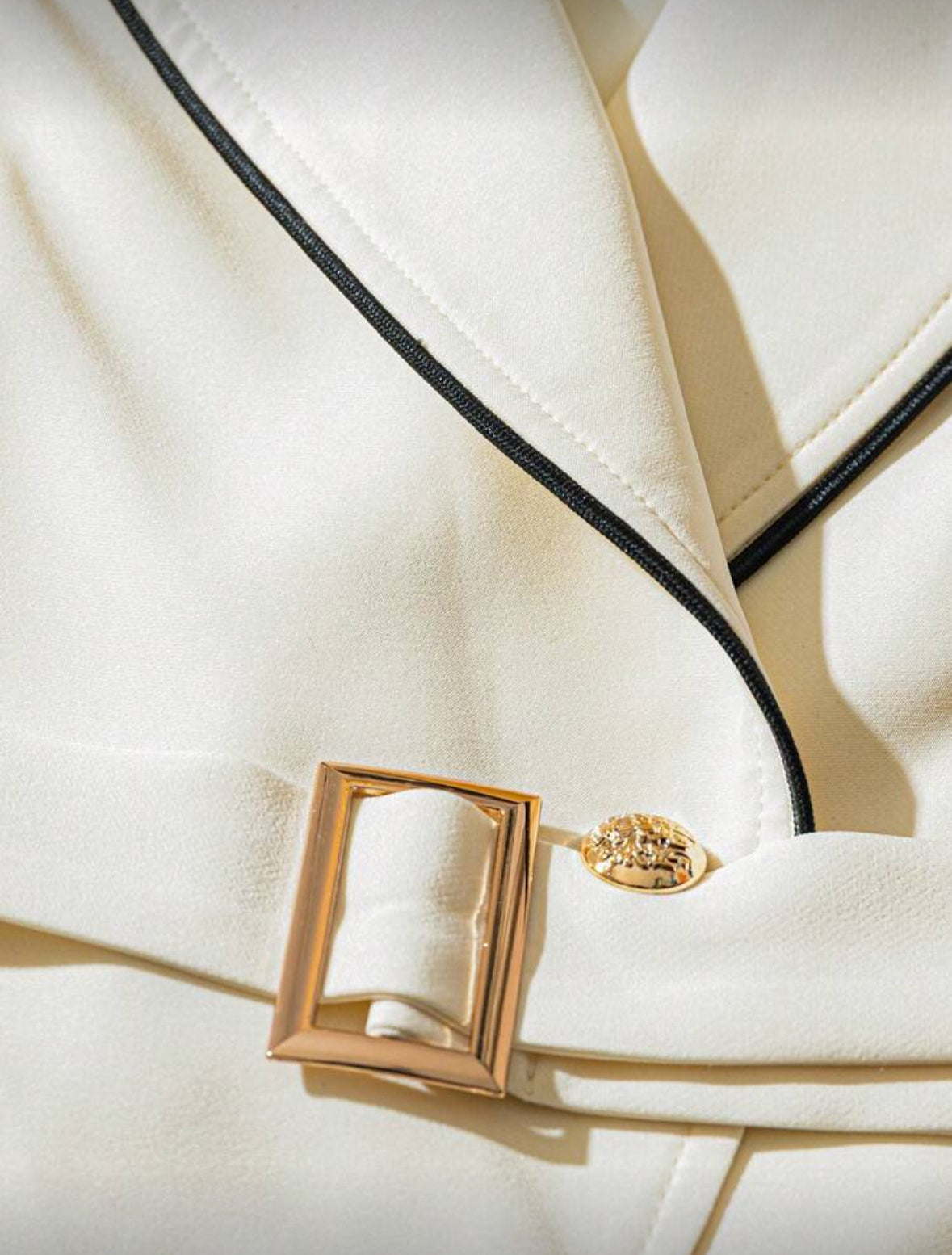 Veste élégante avec ceinture