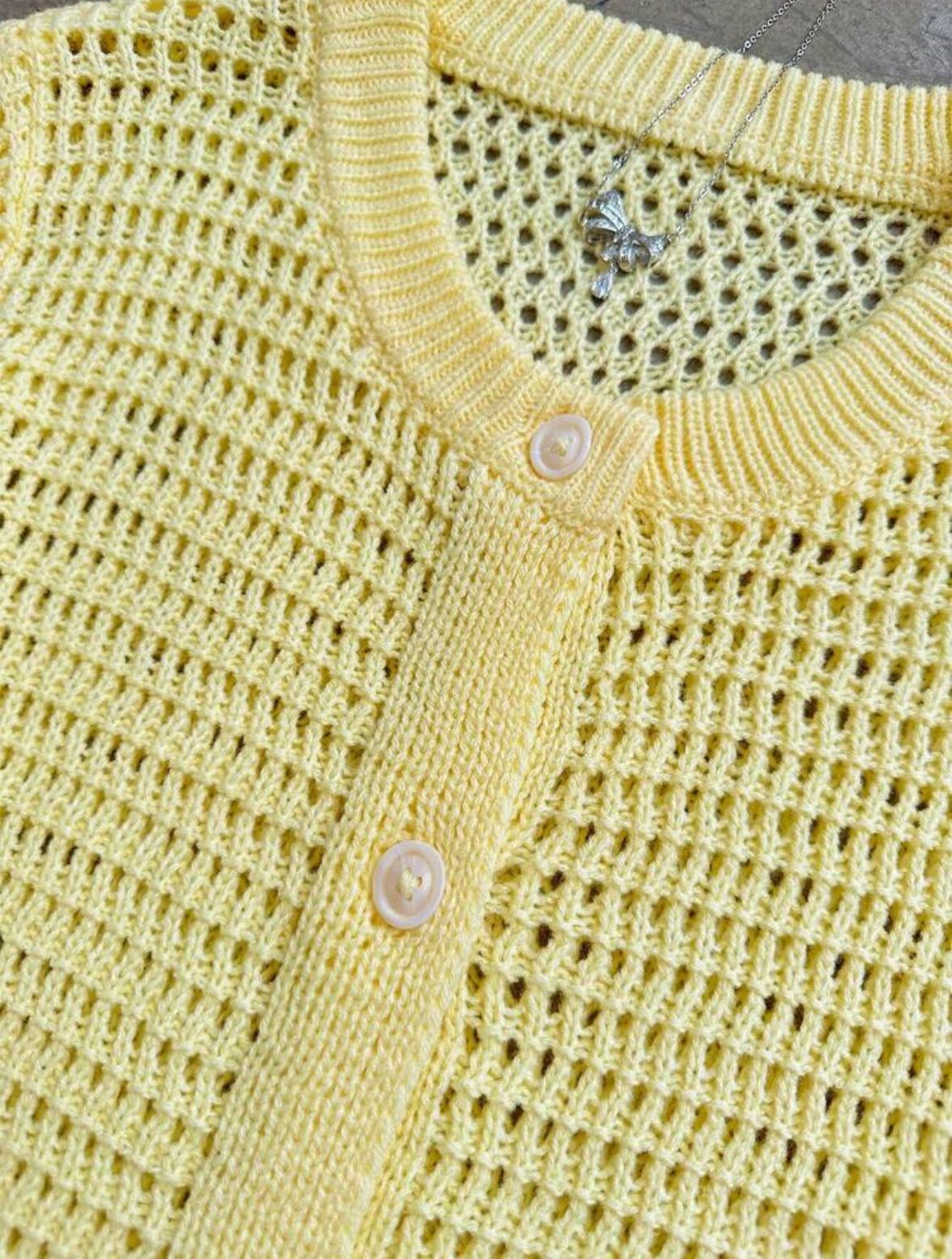 Cardigan tricoté à manches courtes