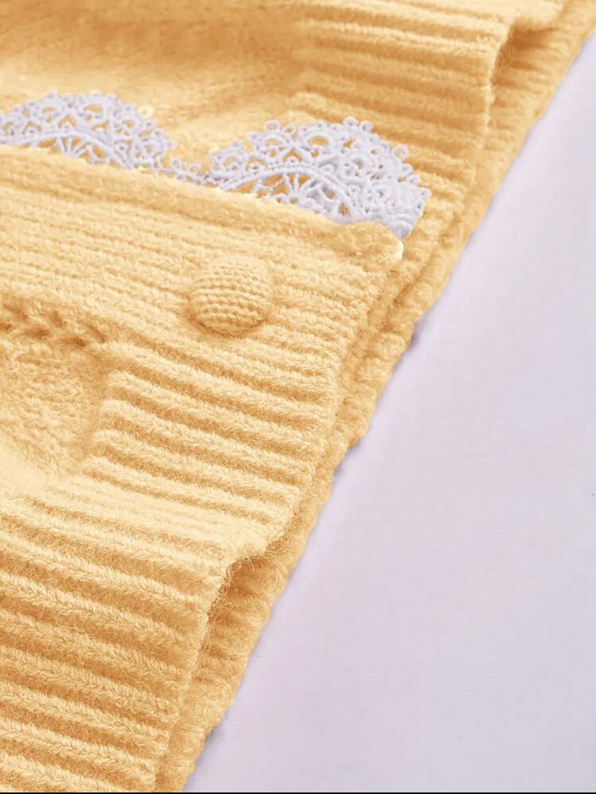 Veste tricotée avec design en dentelle Jaune