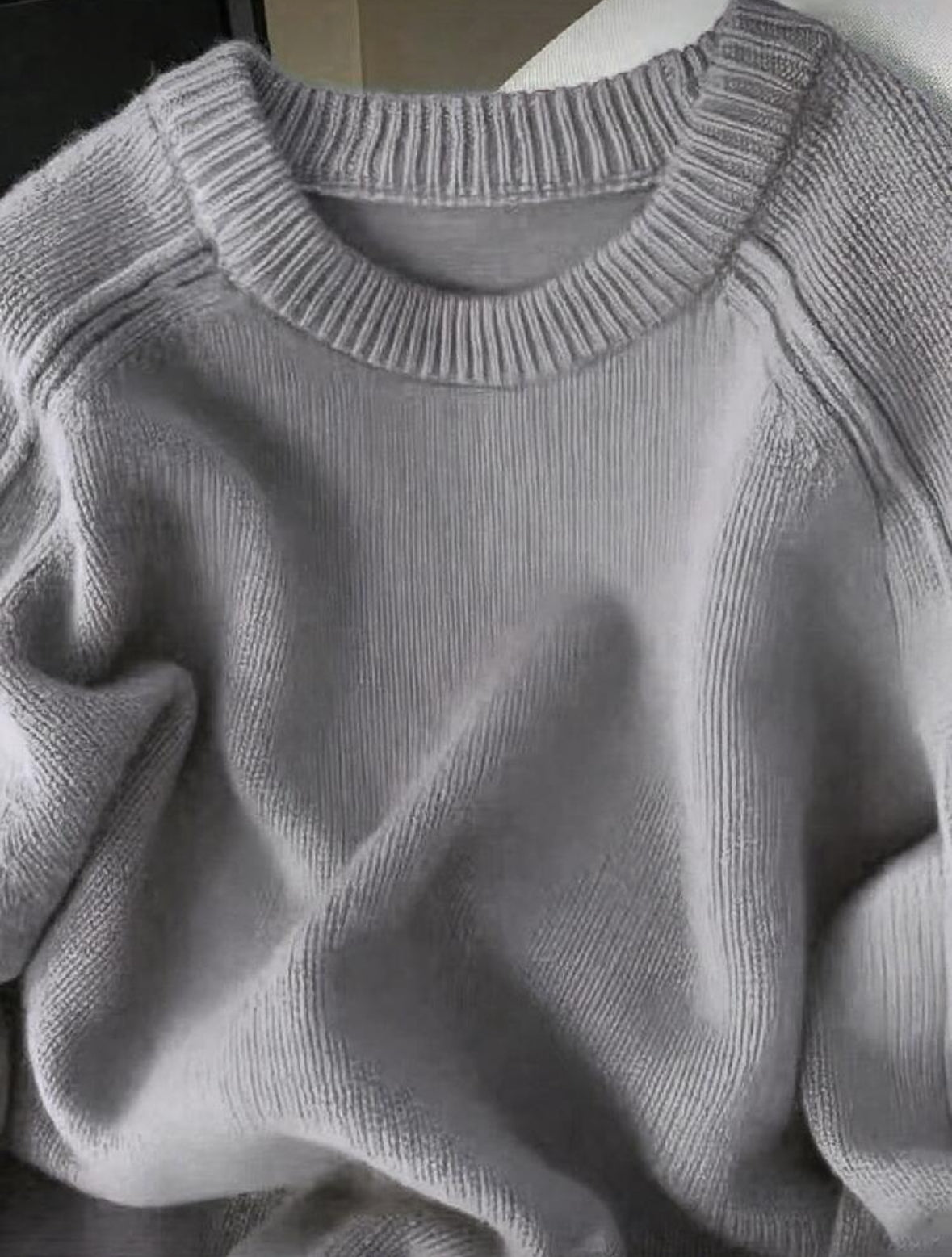 Pull tricoté à manches raglan