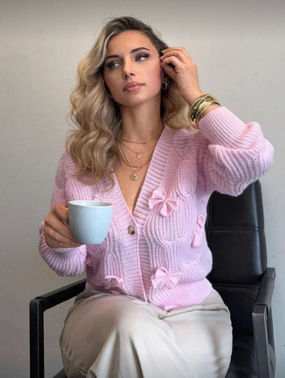 Cardigan rose à noeuds