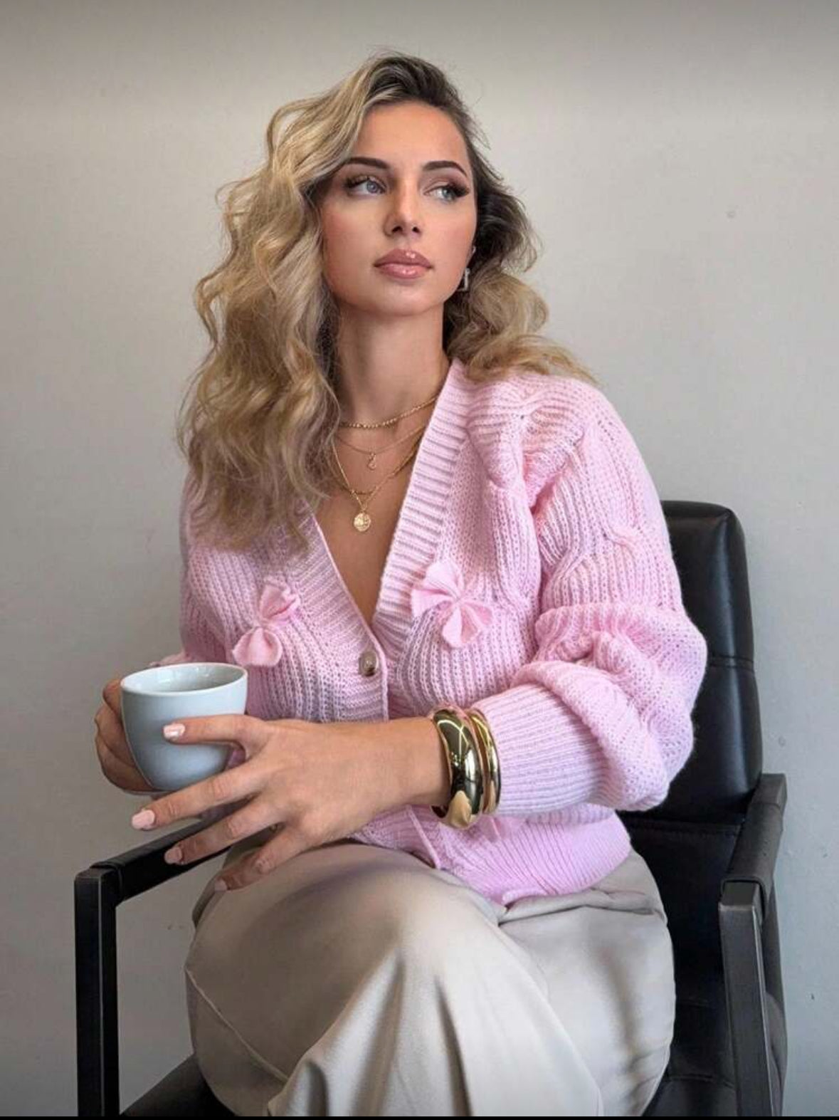 Cardigan rose à noeuds