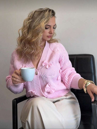 Cardigan rose à noeuds