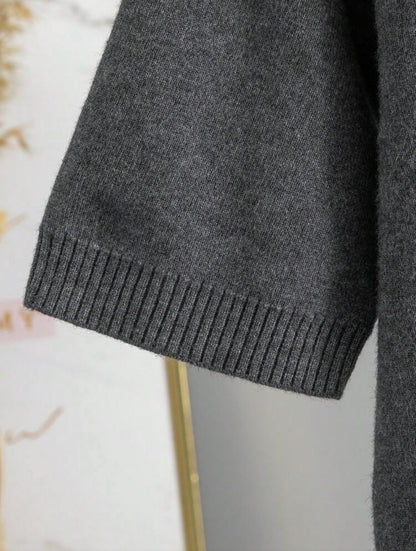 Pull col roulé