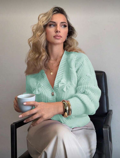 Cardigan rose à noeuds