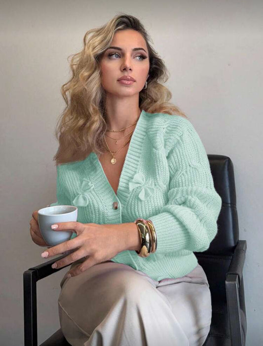 Cardigan rose à noeuds