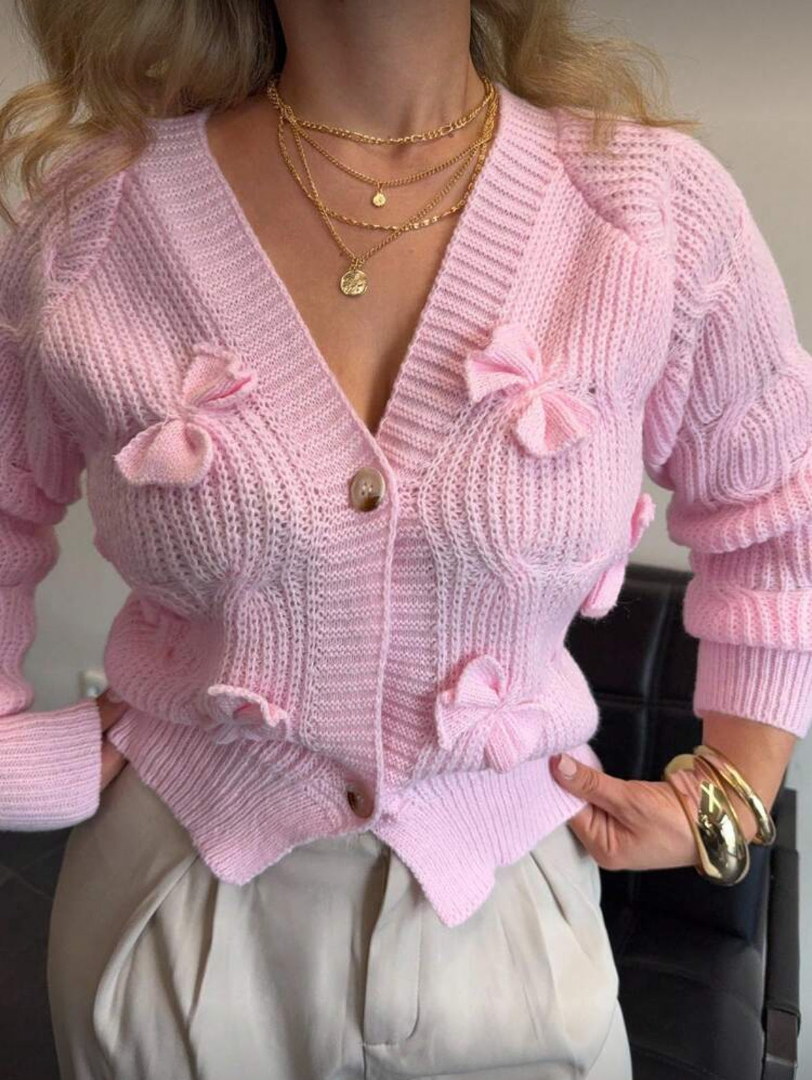Cardigan rose à noeuds
