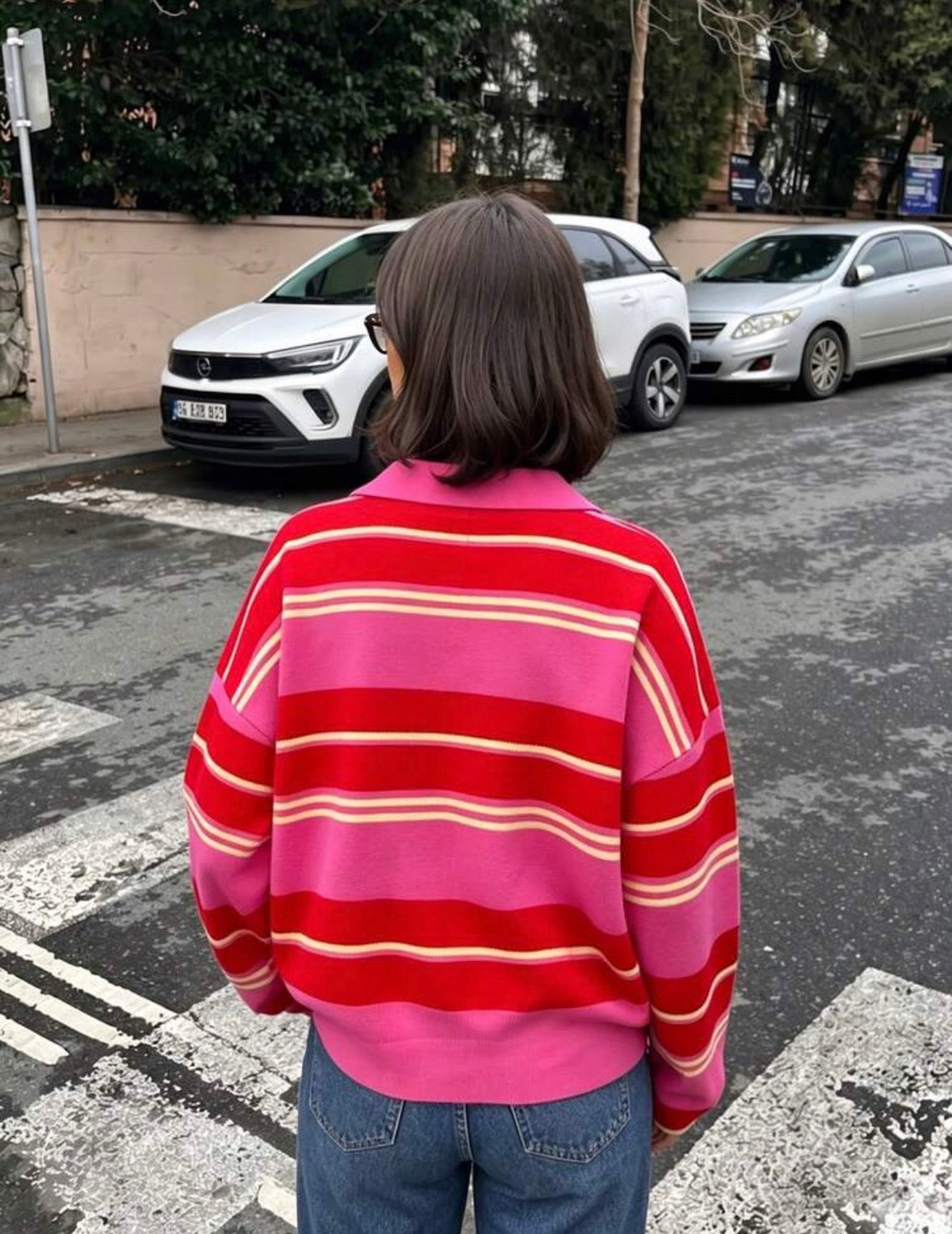 Pull à col polo rayé