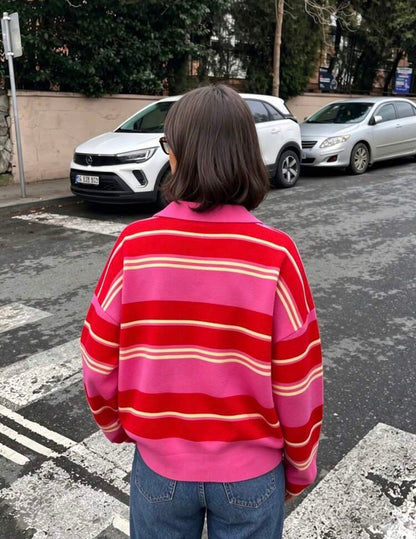 Pull à col polo rayé