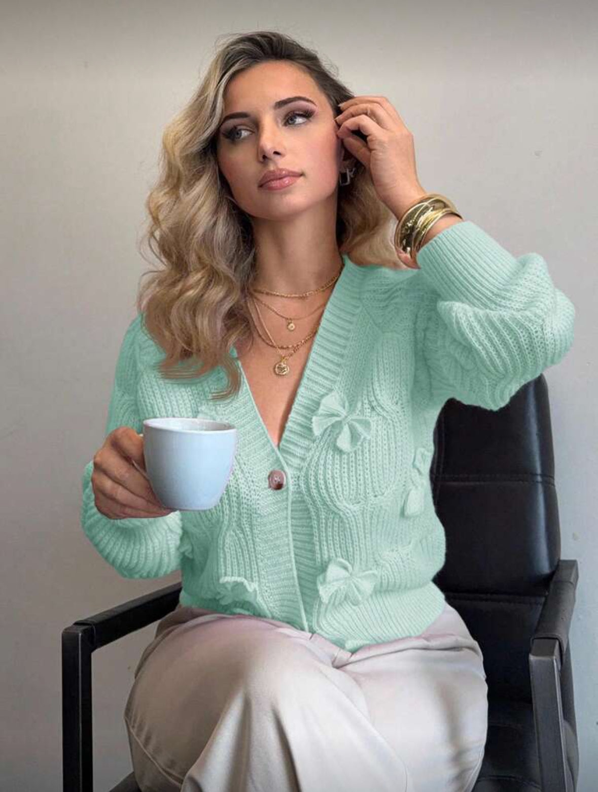 Cardigan rose à noeuds