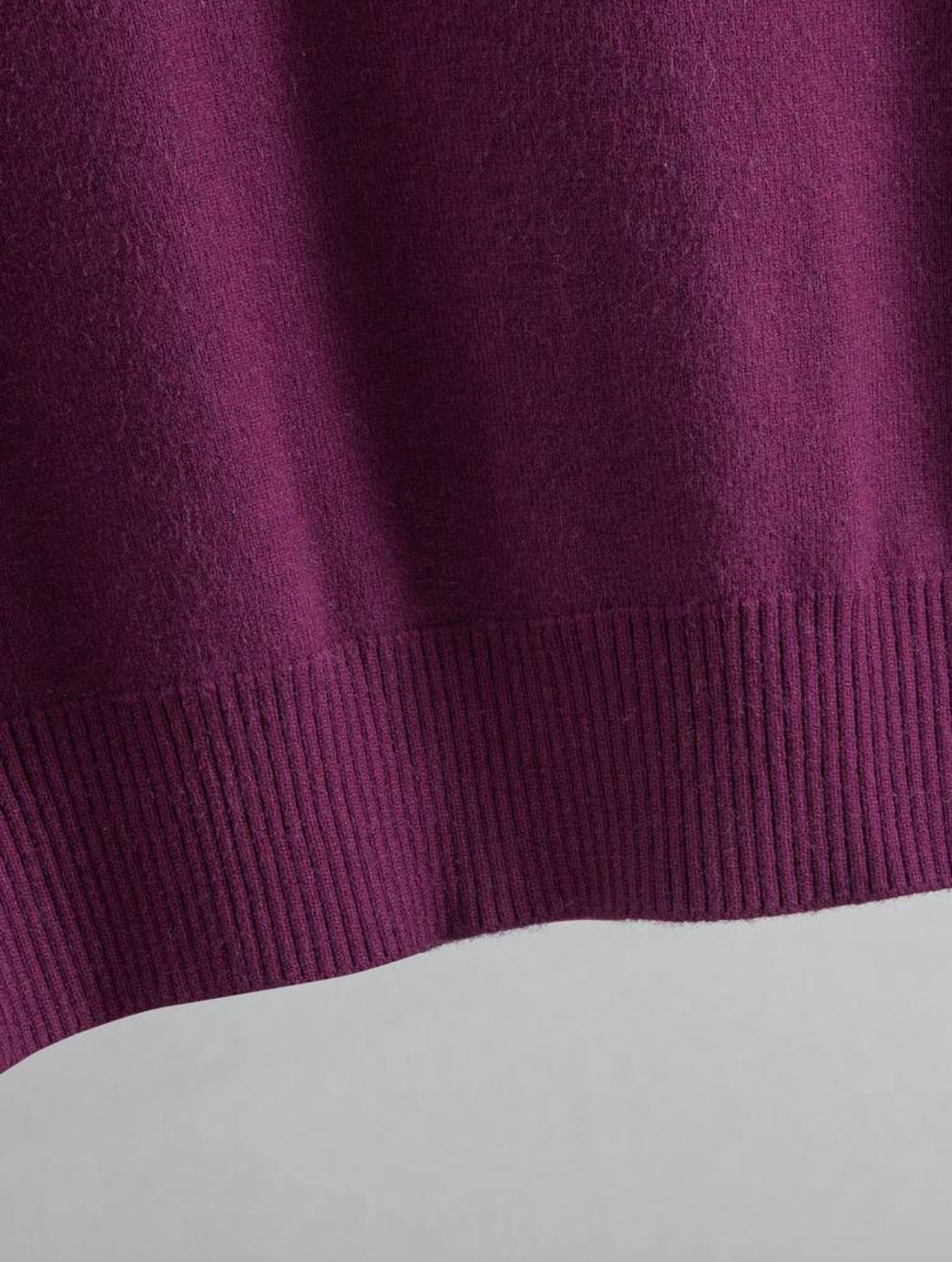 Pull col roulé